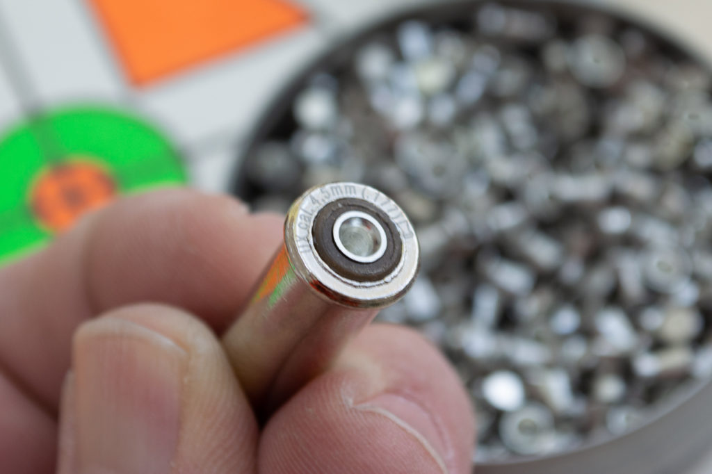 To load, place a pellet in each cartridge then insert the cartridges just like the real thing.