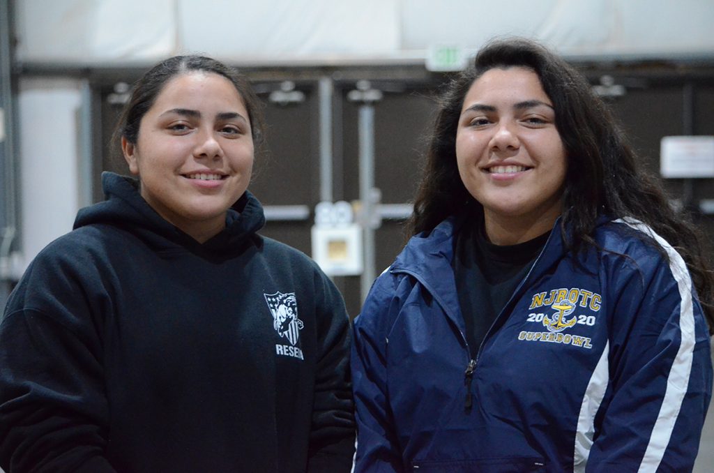 The Mendoza twins compete together on their Reseda Charter High School NJROTC rifle team.