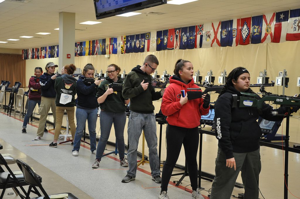 The JROTC and CMP Three-Position events combine three stages: prone, standing and kneeling.