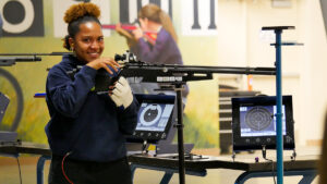 Kalinn White of Zion Benton Township High School smiles after she finished first in the Final.