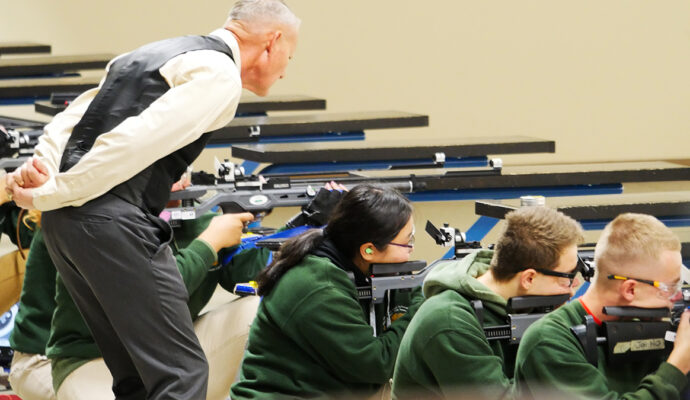 Nation Ford High School can be recognized on the firing line by their forest green sweatshirts.